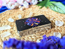 Load image into Gallery viewer, The Spirit Allies Oracle Deck layed in a bundle on a table.
