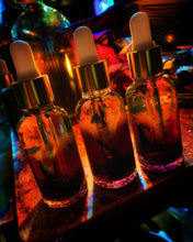 Load image into Gallery viewer, Three bottles of our Samhain Sabbat Oil
